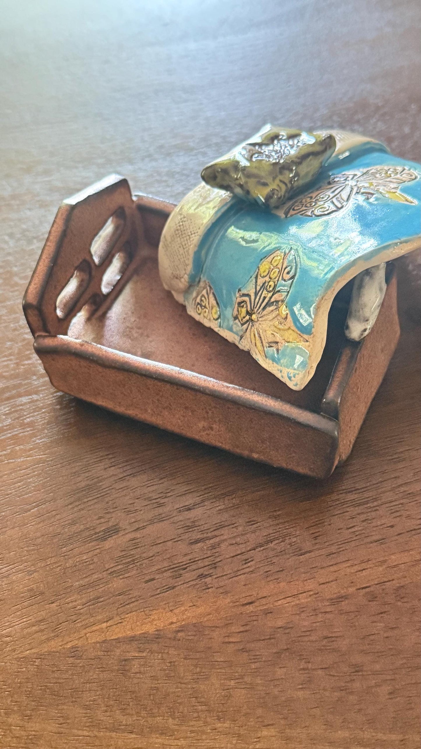 Blue Bed box with a bird