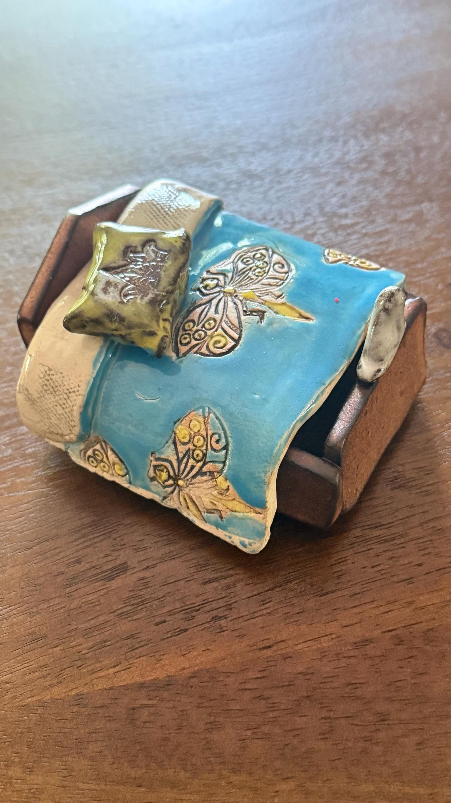 Blue Bed box with a bird