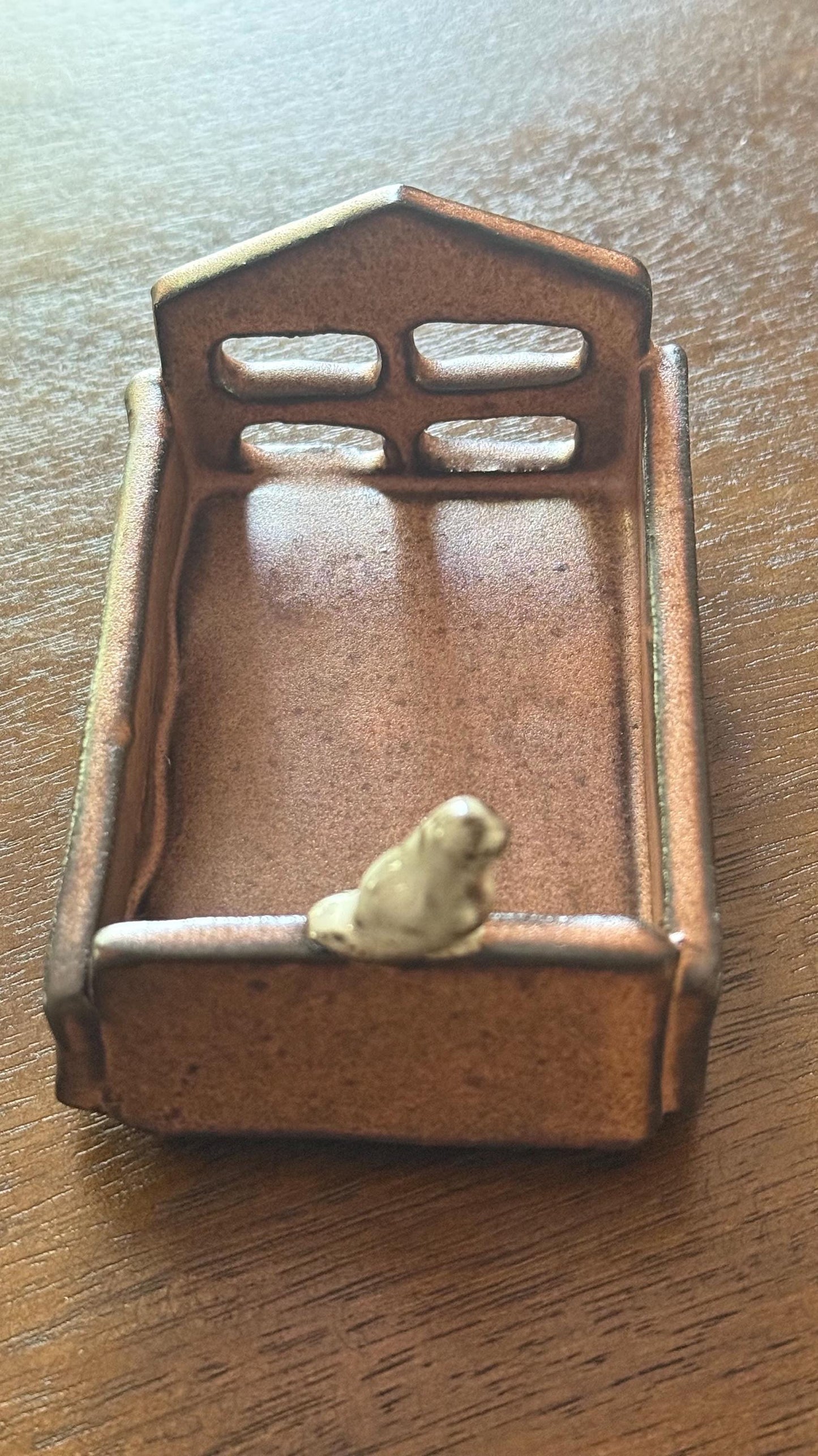 Blue Bed box with a bird