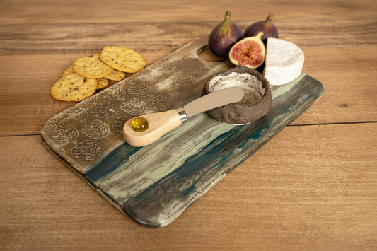 Charcuterie board with bowl for fig jam in a stunning setting